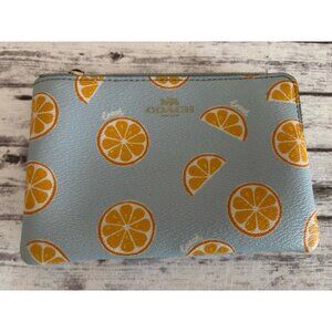 Coach Signature Coated Canvas Small Wristlet in Orange Print Orange Blue